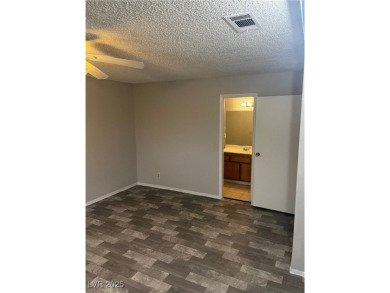 SPACIOUS TOWNHOUSE WITH 2 CAR GARAGE !  UNIQUE COMMUNITY THAT on Las Vegas National Golf Club in Nevada - for sale on GolfHomes.com, golf home, golf lot