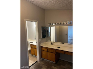 SPACIOUS TOWNHOUSE WITH 2 CAR GARAGE !  UNIQUE COMMUNITY THAT on Las Vegas National Golf Club in Nevada - for sale on GolfHomes.com, golf home, golf lot