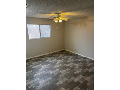 SPACIOUS TOWNHOUSE WITH 2 CAR GARAGE !  UNIQUE COMMUNITY THAT on Las Vegas National Golf Club in Nevada - for sale on GolfHomes.com, golf home, golf lot