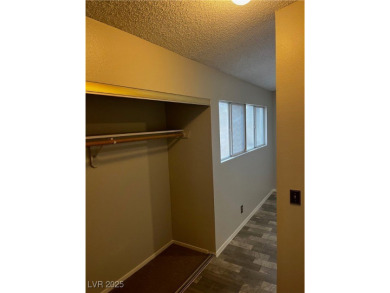 SPACIOUS TOWNHOUSE WITH 2 CAR GARAGE !  UNIQUE COMMUNITY THAT on Las Vegas National Golf Club in Nevada - for sale on GolfHomes.com, golf home, golf lot