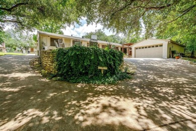 ENCHANTING 3-3-2 home nestled on a beautiful 1+ acre riverfront on Pecan Plantation Country Club in Texas - for sale on GolfHomes.com, golf home, golf lot