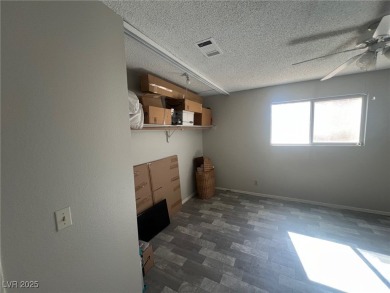 SPACIOUS TOWNHOUSE WITH 2 CAR GARAGE !  UNIQUE COMMUNITY THAT on Las Vegas National Golf Club in Nevada - for sale on GolfHomes.com, golf home, golf lot