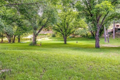 ENCHANTING 3-3-2 home nestled on a beautiful 1+ acre riverfront on Pecan Plantation Country Club in Texas - for sale on GolfHomes.com, golf home, golf lot