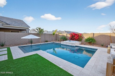 Pool home with a spa & panoramic views of the White Tank on Verrado Golf Club  in Arizona - for sale on GolfHomes.com, golf home, golf lot