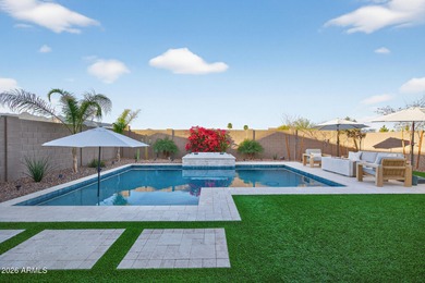 Pool home with a spa & panoramic views of the White Tank on Verrado Golf Club  in Arizona - for sale on GolfHomes.com, golf home, golf lot