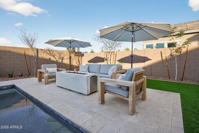 Pool home with a spa & panoramic views of the White Tank on Verrado Golf Club  in Arizona - for sale on GolfHomes.com, golf home, golf lot