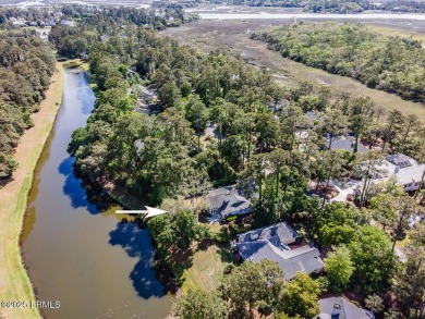 Discover the perfect blend of Southern charm and modern comfort on Dataw Island Club in South Carolina - for sale on GolfHomes.com, golf home, golf lot