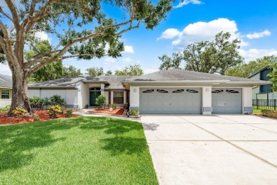 Welcome to this beautiful 4 bed 3 bath home located on the third on East Lake Woodlands Country Club in Florida - for sale on GolfHomes.com, golf home, golf lot