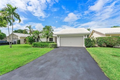 Discover Paradise. A well updated home, perfectly situated in on  in Florida - for sale on GolfHomes.com, golf home, golf lot