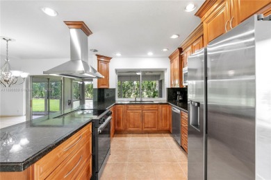 Discover Paradise. A well updated home, perfectly situated in on  in Florida - for sale on GolfHomes.com, golf home, golf lot