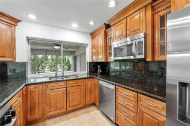 Discover Paradise. A well updated home, perfectly situated in on  in Florida - for sale on GolfHomes.com, golf home, golf lot