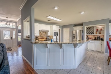 Experience refined living in this stunning golf course residence on Pecan Plantation Country Club in Texas - for sale on GolfHomes.com, golf home, golf lot