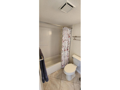 Turnkey, Just Painted 2 bed 2 bath 2 walk-ins double pantry 2 on Sunrise Lakes Phase IV Golf Course in Florida - for sale on GolfHomes.com, golf home, golf lot