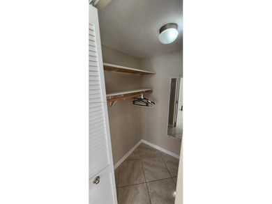 Turnkey, Just Painted 2 bed 2 bath 2 walk-ins double pantry 2 on Sunrise Lakes Phase IV Golf Course in Florida - for sale on GolfHomes.com, golf home, golf lot