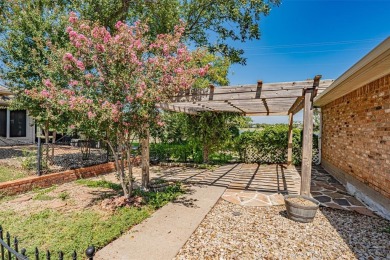 Experience refined living in this stunning golf course residence on Pecan Plantation Country Club in Texas - for sale on GolfHomes.com, golf home, golf lot