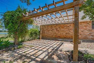Experience refined living in this stunning golf course residence on Pecan Plantation Country Club in Texas - for sale on GolfHomes.com, golf home, golf lot