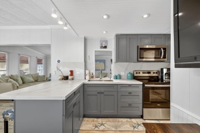 Welcome to island living at its finest! This beautifully updated on Island Dunes Country Club in Florida - for sale on GolfHomes.com, golf home, golf lot