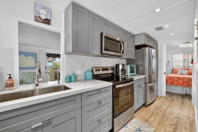 Welcome to island living at its finest! This beautifully updated on Island Dunes Country Club in Florida - for sale on GolfHomes.com, golf home, golf lot