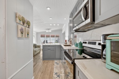 Welcome to island living at its finest! This beautifully updated on Island Dunes Country Club in Florida - for sale on GolfHomes.com, golf home, golf lot