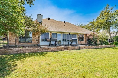 Experience refined living in this stunning golf course residence on Pecan Plantation Country Club in Texas - for sale on GolfHomes.com, golf home, golf lot