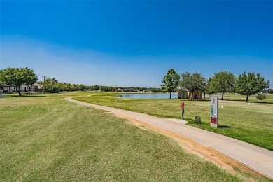 Experience refined living in this stunning golf course residence on Pecan Plantation Country Club in Texas - for sale on GolfHomes.com, golf home, golf lot