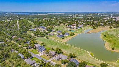 Experience refined living in this stunning golf course residence on Pecan Plantation Country Club in Texas - for sale on GolfHomes.com, golf home, golf lot