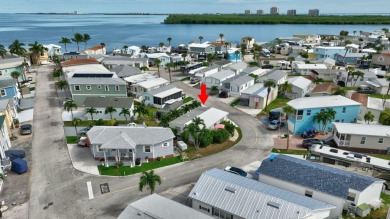 Welcome to island living at its finest! This beautifully updated on Island Dunes Country Club in Florida - for sale on GolfHomes.com, golf home, golf lot