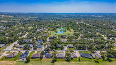 Experience refined living in this stunning golf course residence on Pecan Plantation Country Club in Texas - for sale on GolfHomes.com, golf home, golf lot