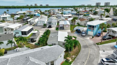 Welcome to island living at its finest! This beautifully updated on Island Dunes Country Club in Florida - for sale on GolfHomes.com, golf home, golf lot