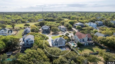 This Charming Golf Course Retreat Is A Coastal Gem! Nestled on Seascape Golf Links in North Carolina - for sale on GolfHomes.com, golf home, golf lot