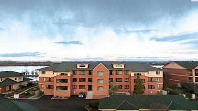 Experience luxury living with breathtaking waterfront vistas in on Columbia Point Golf Course in Washington - for sale on GolfHomes.com, golf home, golf lot