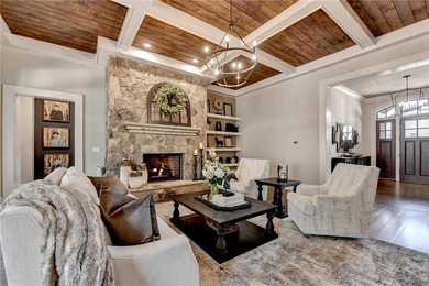 Rustic elegance is realized in this five bedroom, seven and a on The River Club in Georgia - for sale on GolfHomes.com, golf home, golf lot