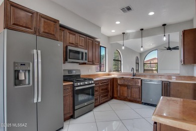 Discover this spacious, beautifully updated modern home on Omni Tucson National Golf Resort and Spa - Sonoran in Arizona - for sale on GolfHomes.com, golf home, golf lot