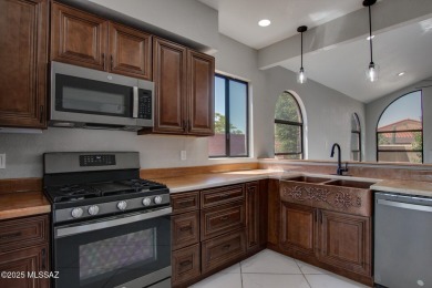 Discover this spacious, beautifully updated modern home on Omni Tucson National Golf Resort and Spa - Sonoran in Arizona - for sale on GolfHomes.com, golf home, golf lot