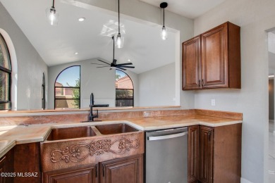 Discover this spacious, beautifully updated modern home on Omni Tucson National Golf Resort and Spa - Sonoran in Arizona - for sale on GolfHomes.com, golf home, golf lot