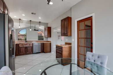 Discover this spacious, beautifully updated modern home on Omni Tucson National Golf Resort and Spa - Sonoran in Arizona - for sale on GolfHomes.com, golf home, golf lot