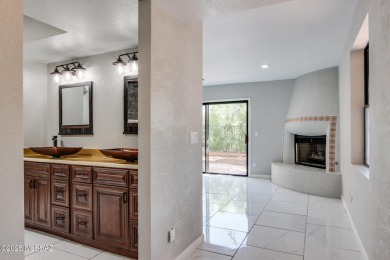 Discover this spacious, beautifully updated modern home on Omni Tucson National Golf Resort and Spa - Sonoran in Arizona - for sale on GolfHomes.com, golf home, golf lot