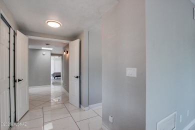 Discover this spacious, beautifully updated modern home on Omni Tucson National Golf Resort and Spa - Sonoran in Arizona - for sale on GolfHomes.com, golf home, golf lot