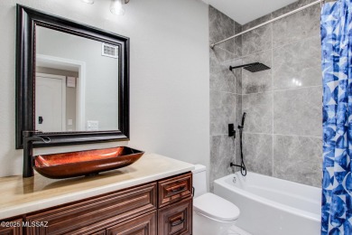 Discover this spacious, beautifully updated modern home on Omni Tucson National Golf Resort and Spa - Sonoran in Arizona - for sale on GolfHomes.com, golf home, golf lot
