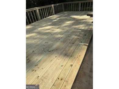 Recently renovated ranch home with, new deck and newer roof is on Honey Creek Country Club in Georgia - for sale on GolfHomes.com, golf home, golf lot