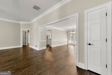 Recently renovated ranch home with, new deck and newer roof is on Honey Creek Country Club in Georgia - for sale on GolfHomes.com, golf home, golf lot