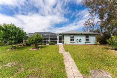 This custom-built, 4-bedroom, solar, waterfront home with a pool on Port Charlotte Golf Club in Florida - for sale on GolfHomes.com, golf home, golf lot