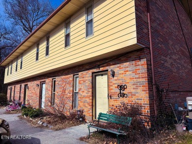 Delightful 2-bed, 1.5-bath townhouse perfect for both homeowners on Whittle Springs Golf Course in Tennessee - for sale on GolfHomes.com, golf home, golf lot