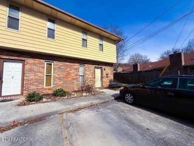 Delightful 2-bed, 1.5-bath townhouse perfect for both homeowners on Whittle Springs Golf Course in Tennessee - for sale on GolfHomes.com, golf home, golf lot