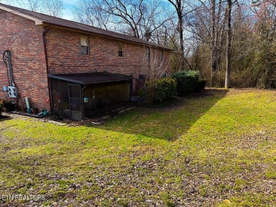 Delightful 2-bed, 1.5-bath townhouse perfect for both homeowners on Whittle Springs Golf Course in Tennessee - for sale on GolfHomes.com, golf home, golf lot