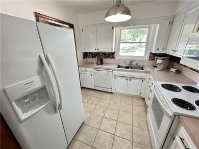 This adorable townhome offers the perfect blend of comfort and on Bella Vista Country Club - Berksdale in Arkansas - for sale on GolfHomes.com, golf home, golf lot