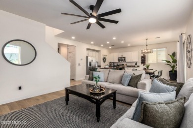 Elevated desert living in this exquisitely remodeled 3-bedroom on Quarry Pines Golf Club  in Arizona - for sale on GolfHomes.com, golf home, golf lot