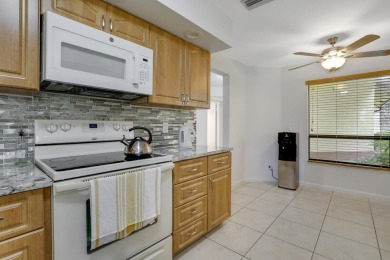 Great 3 bedroom 2.5 bath, 2 car garage corner townhome located on Boca Delray Golf and Country Club in Florida - for sale on GolfHomes.com, golf home, golf lot