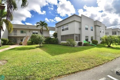 Beautifully updated, 2/2 first floor corner unit condo in King's on  in Florida - for sale on GolfHomes.com, golf home, golf lot