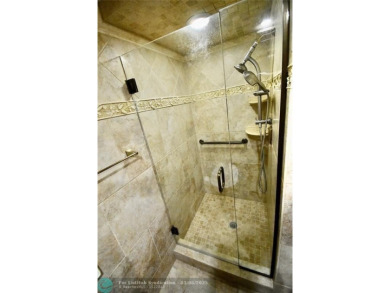 Beautifully updated, 2/2 first floor corner unit condo in King's on  in Florida - for sale on GolfHomes.com, golf home, golf lot